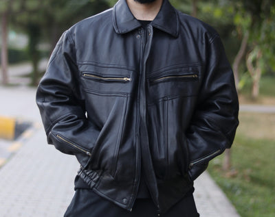 Black collared jacket size Large worn by a model